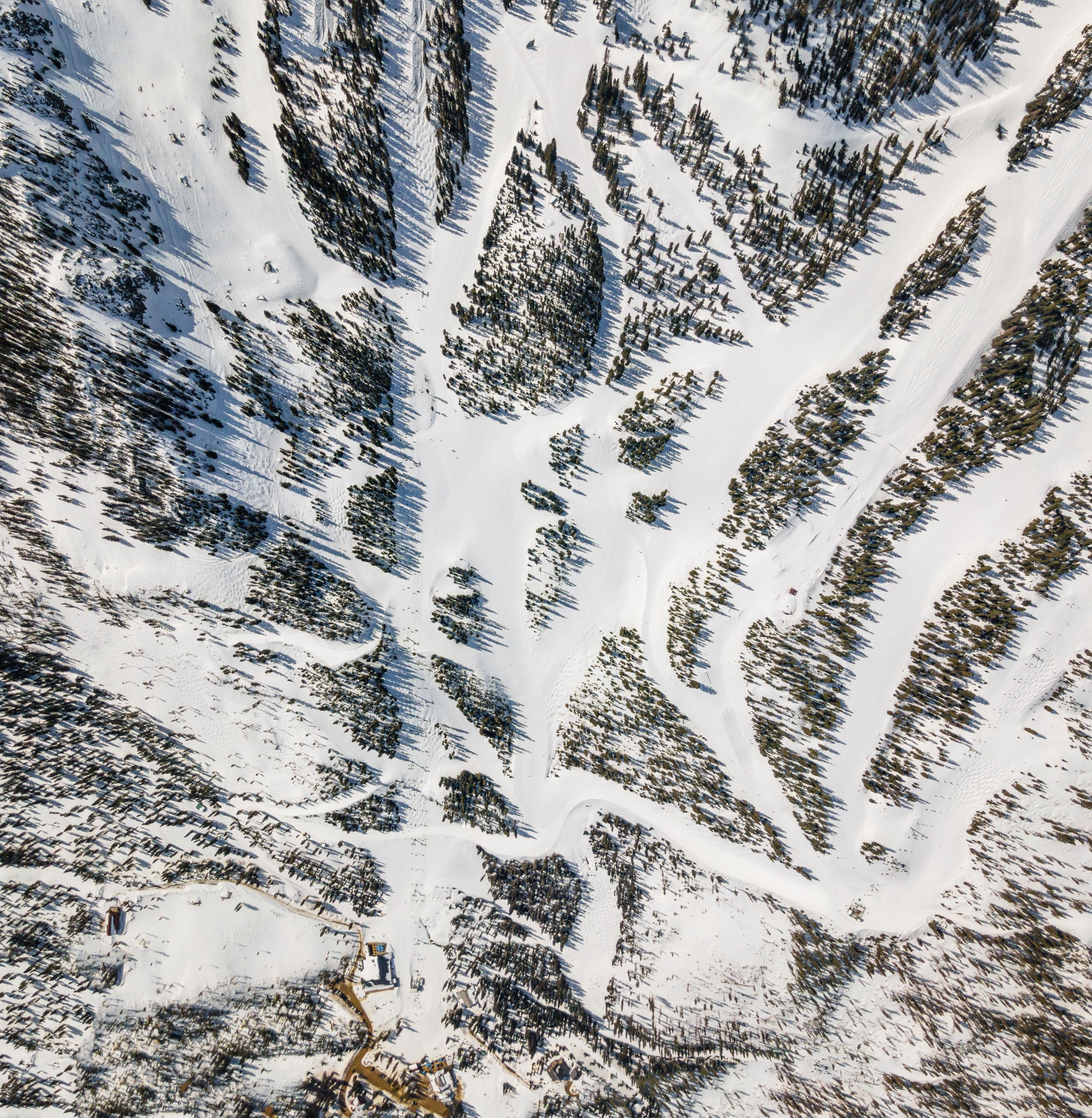 A drone shot from high above of ski trails at Taos Ski Valley