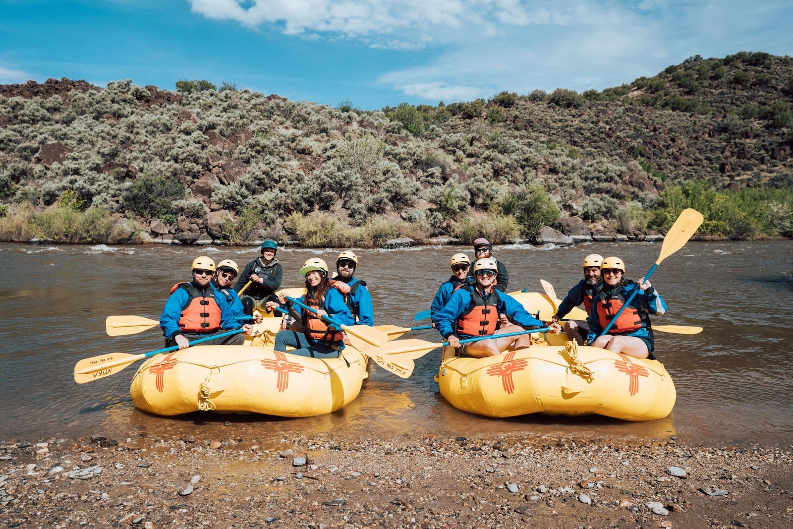 Two rafts on the shore of the Rio Grande in Taos, New Mexico.