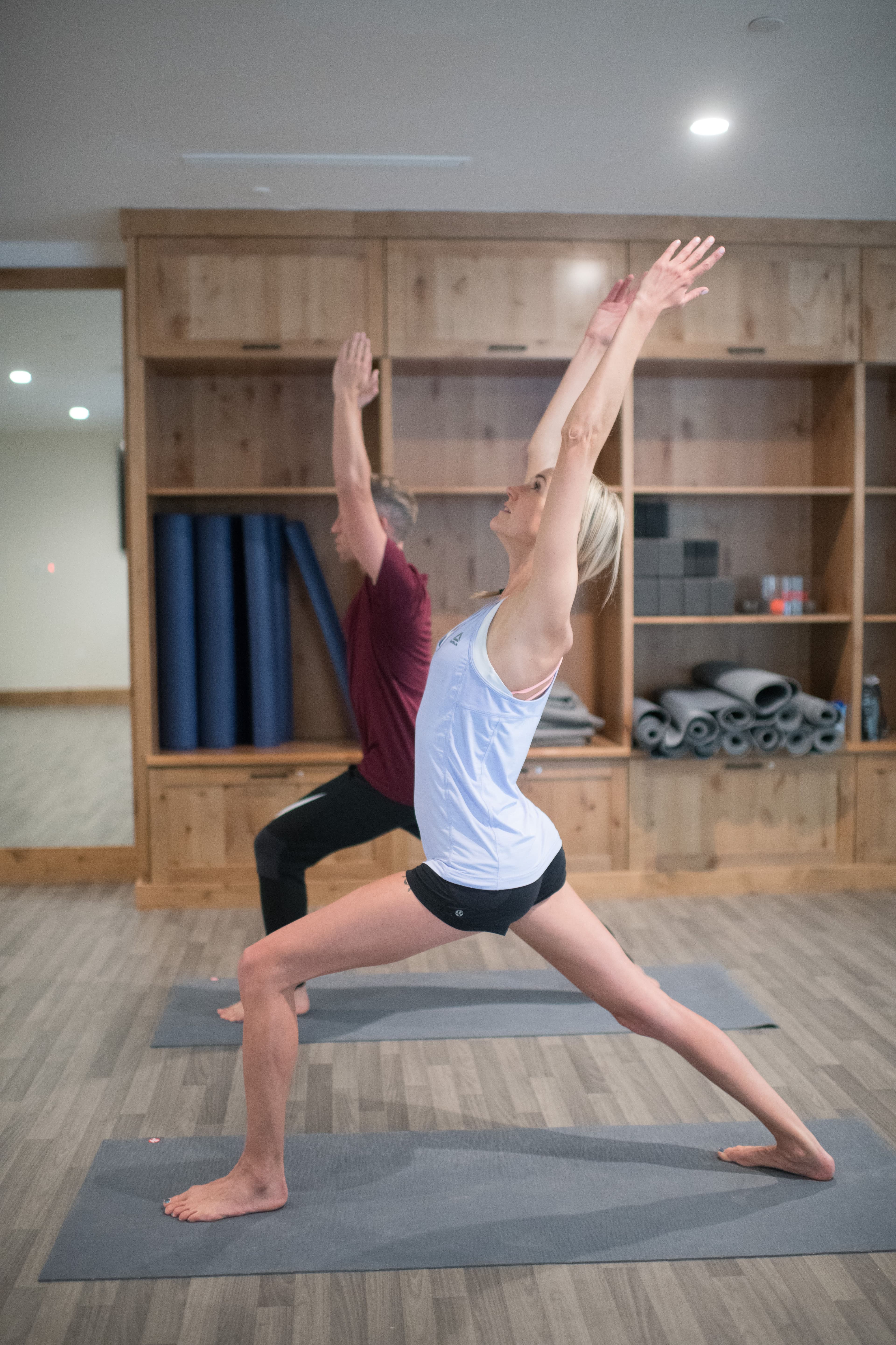 Two Blake guests doing Yoga in the fitness center