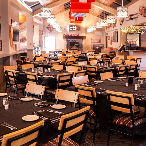The Martini Tree, a bar and event space, set up with tables and chairs for an event at Taos Ski Valley.