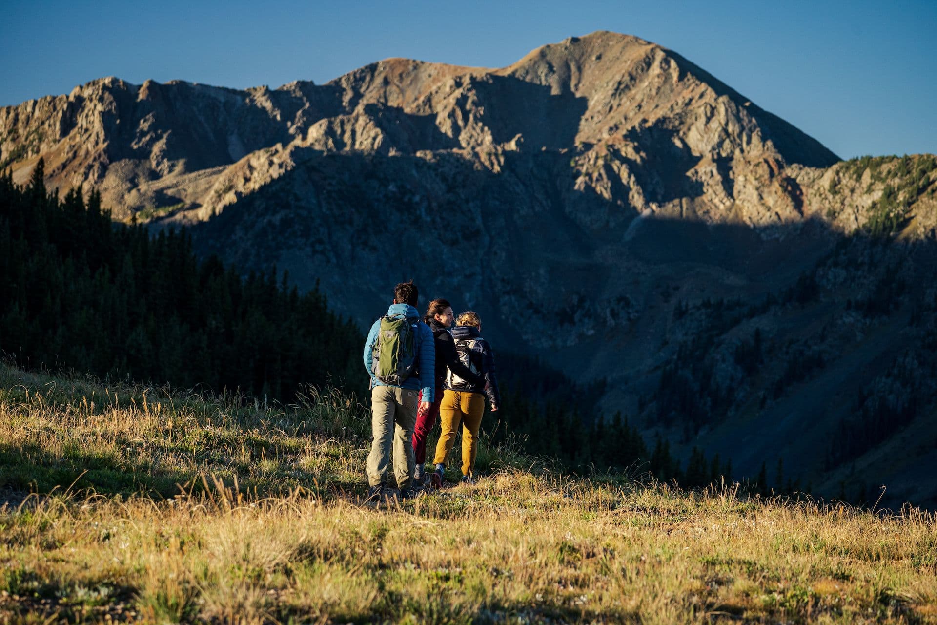 Hikers hiking the ridge at Taos Ski Valley.
