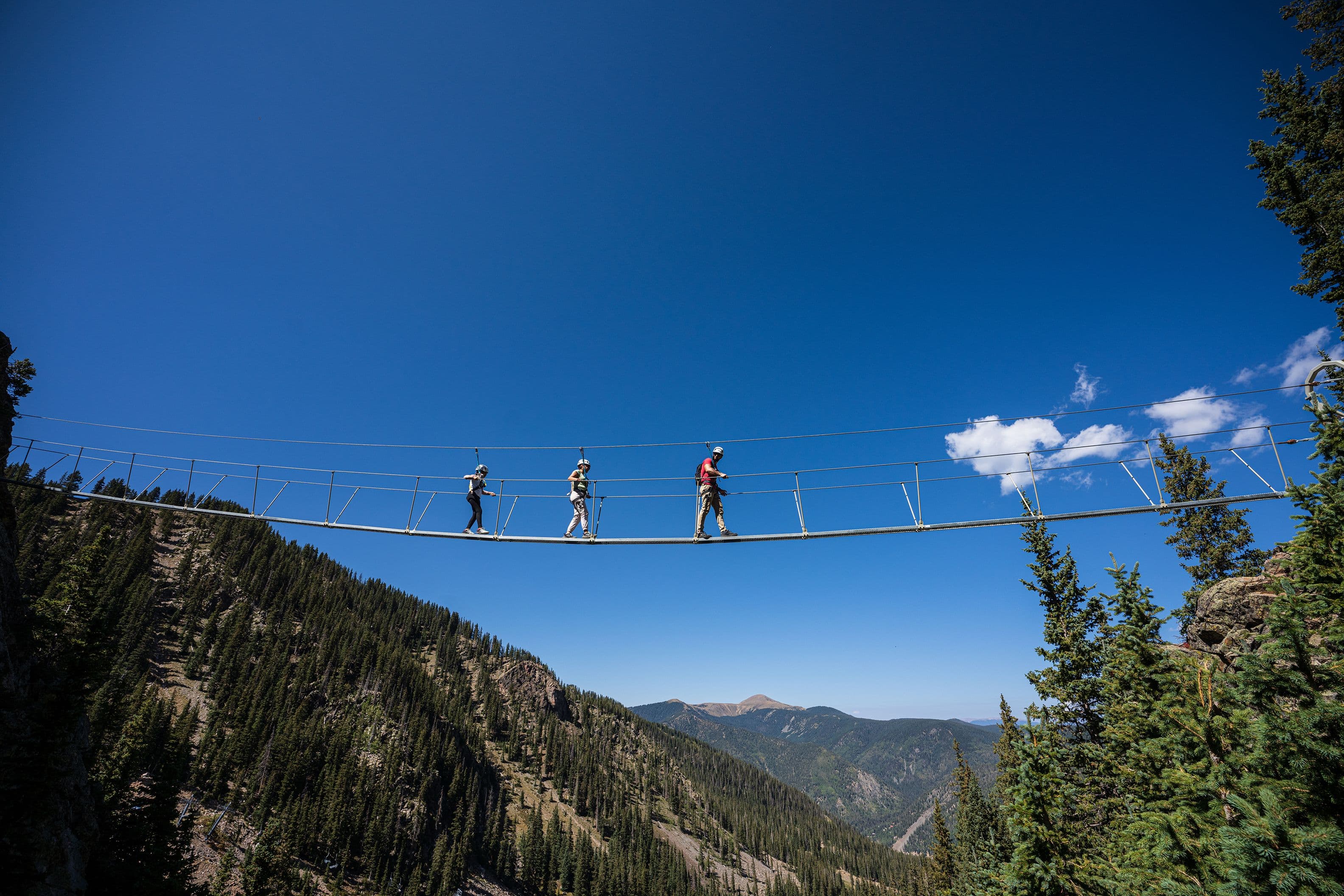 guests take a Via Ferrata climbing tour in the summer