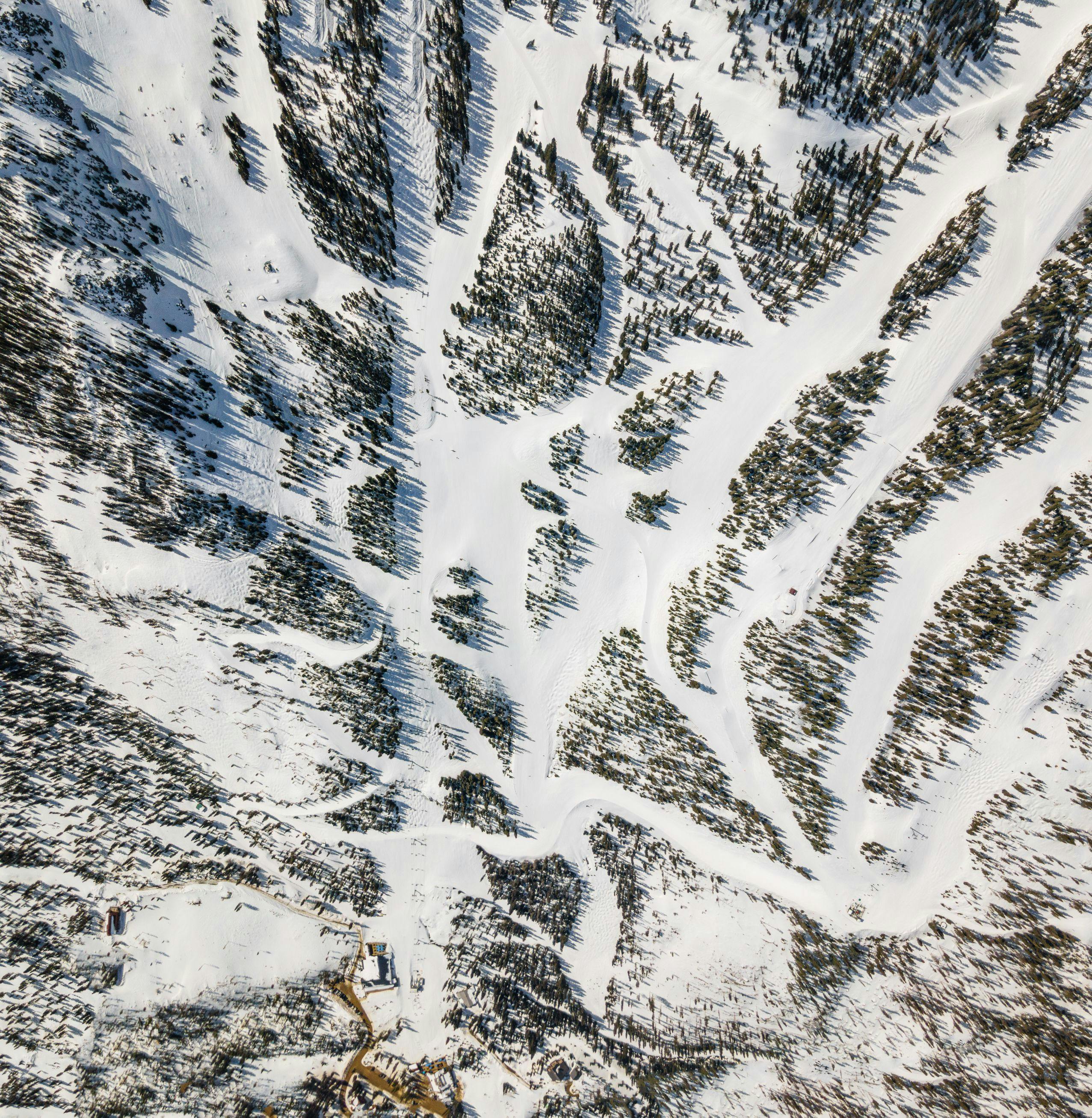 A drone shot from high above of ski trails at Taos Ski Valley