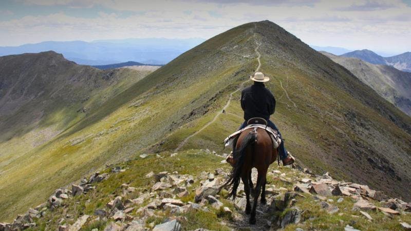 Horseback riding along a ridge near Taos Ski Valley