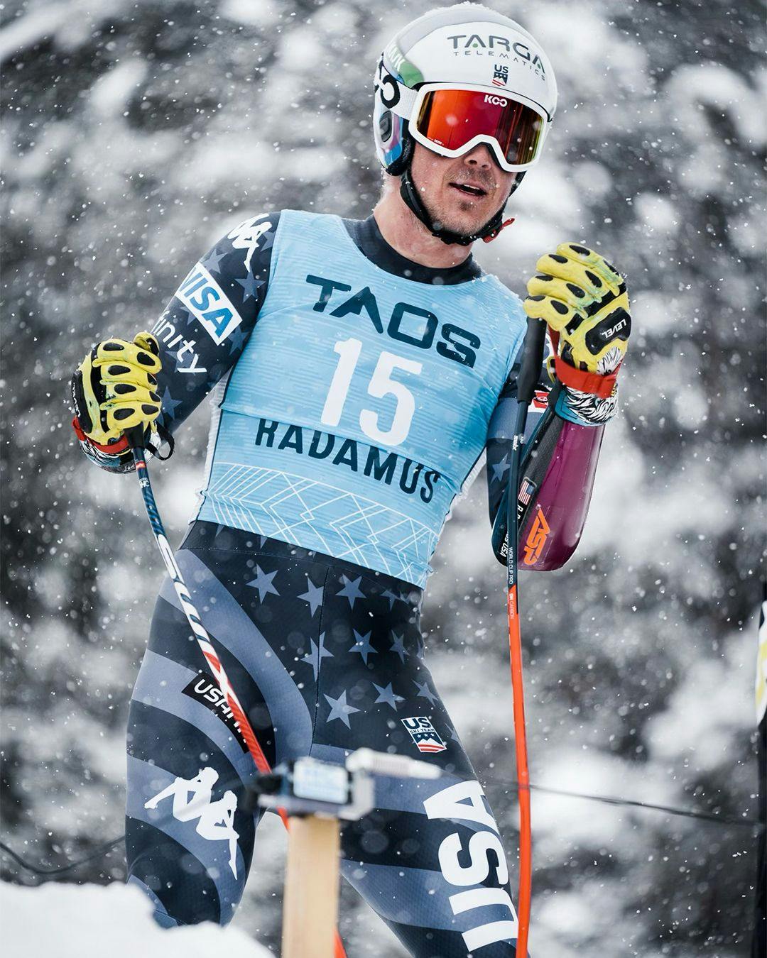 Taos sponsored ski racer River Radamus wears a taos branded ski suit