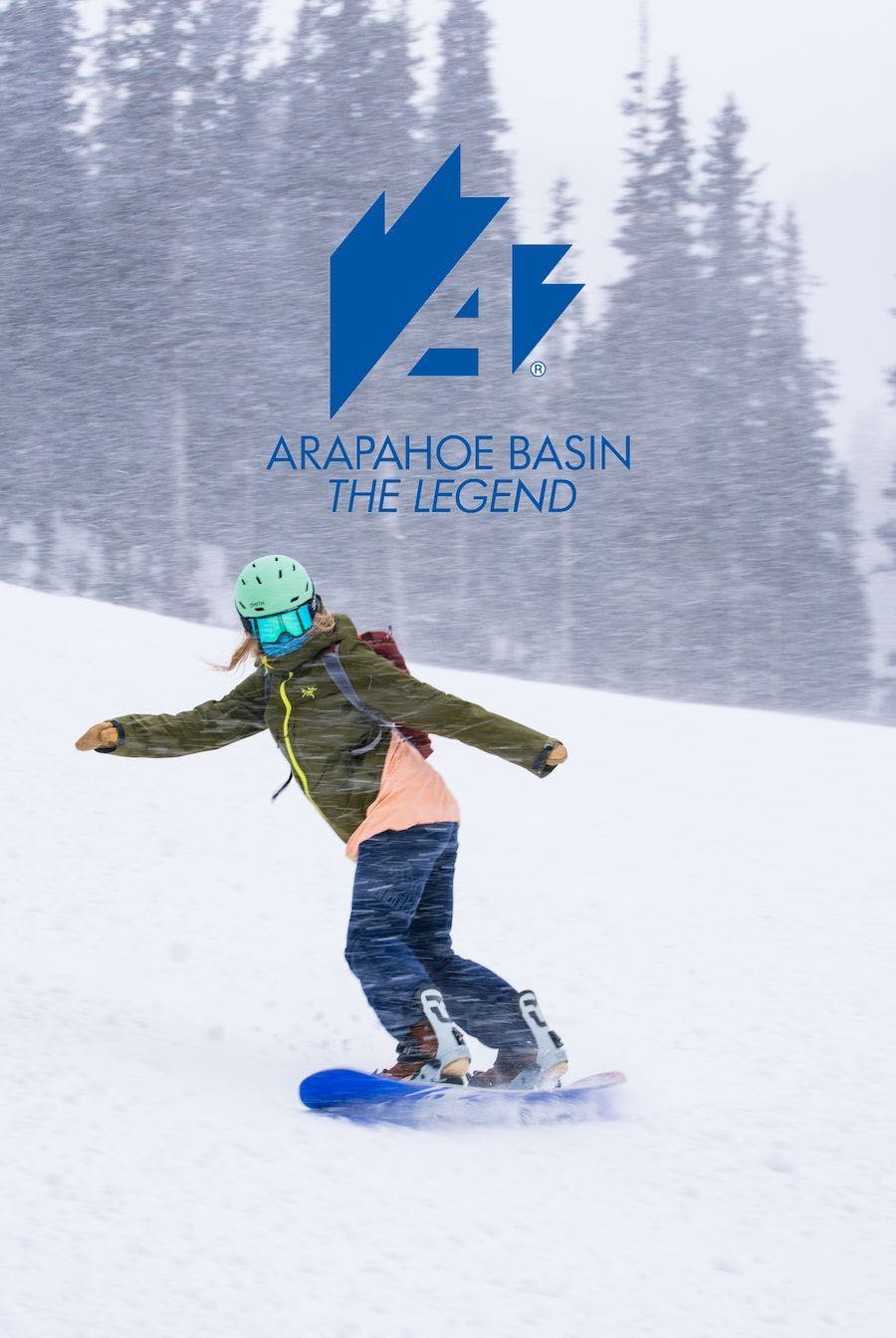 Arapahoe Basin logo with a snowboarder riding on a snowy day