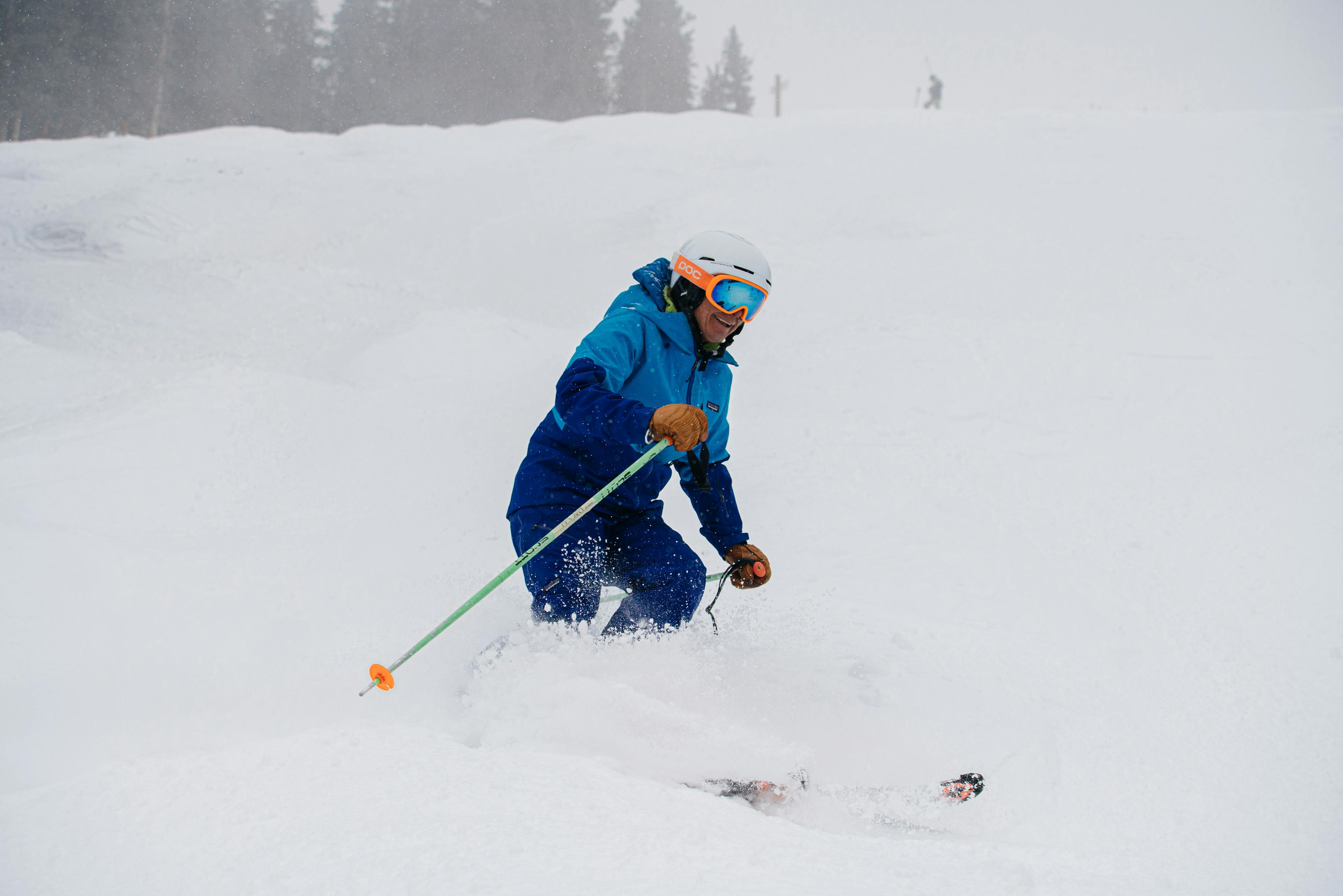 Deb Armstrong skiing on a snowy day at Taos